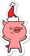 happy sticker cartoon of a pig wearing santa hat