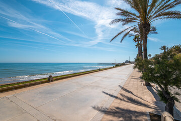 Excellent walks along the shore of the sea with azure water along a pedestrian road made of...