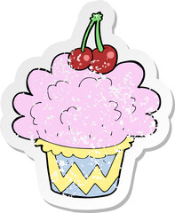 retro distressed sticker of a cartoon cupcake