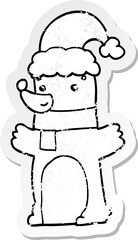Obraz premium distressed sticker of a cartoon bear wearing christmas hat
