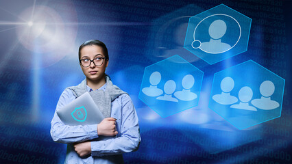 Portrait of young female student with laptop. Digital communication, data protection