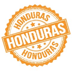 Obraz premium HONDURAS text on orange round stamp sign