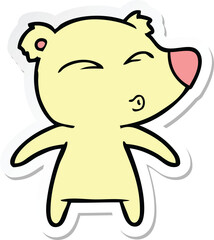 sticker of a cartoon whistling bear