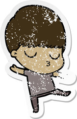 distressed sticker of a cartoon calm boy