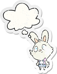 cartoon rabbit shrugging shoulders and thought bubble as a distressed worn sticker