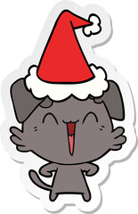 happy little dog sticker cartoon of a wearing santa hat