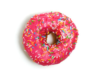 Donut with pink icing and multicolored sugar sprinkles.On white background.