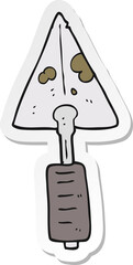 sticker of a cartoon trowel