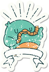 grunge sticker of tattoo style robin with worm