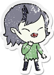 distressed sticker of a cartoon laughing vampire girl
