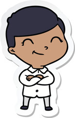 sticker of a cartoon boy smiling
