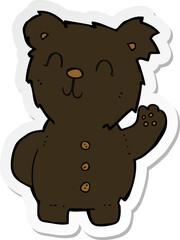 sticker of a cartoon black bear