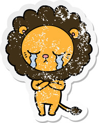distressed sticker of a crying cartoon lion
