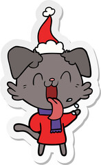 sticker cartoon of a panting dog wearing santa hat