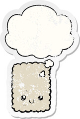 cartoon biscuit and thought bubble as a distressed worn sticker