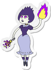sticker of a cartoon vampire girl casting fireball