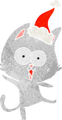 funny retro cartoon of a cat wearing santa hat