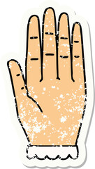 traditional distressed sticker tattoo of a hand
