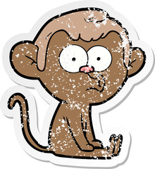 distressed sticker of a cartoon hooting monkey