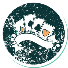 distressed sticker tattoo style icon of cards and banner