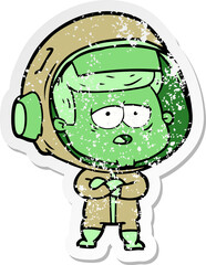 distressed sticker of a cartoon tired astronaut