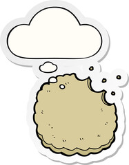 cartoon biscuit and thought bubble as a printed sticker