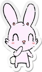 distressed sticker of a cute cartoon rabbit