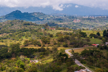 Fototapeta premium Beautiful rural landscape with a road. Colombia.