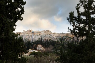 Ruins of Ancient Agora with Acropolis in background during sunset in winter, Athens, Greek, Europe
