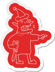 cartoon  sticker of a goblin with knife wearing santa hat