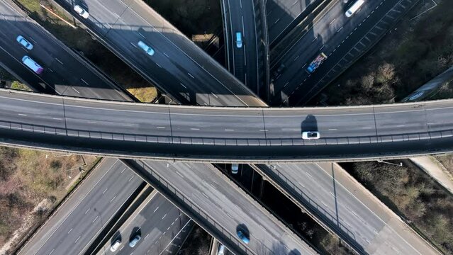 Rush Hour Vehicles Driving on a Motorway Interchange UK Aerial View