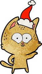 textured cartoon of a cat wearing santa hat