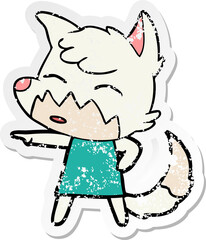distressed sticker of a cartoon fox in dress pointing