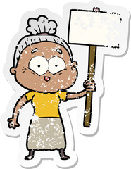 distressed sticker of a cartoon happy old woman