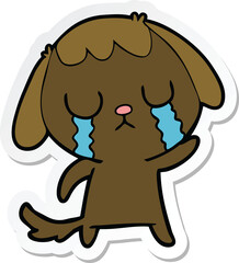 sticker of a cute cartoon dog crying