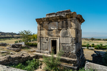 Fototapeta na wymiar Travertine lahid in northern Necropolis of Hierapolis near Pamukkale, Denizli. Old grave monuments, tumulus graves. 