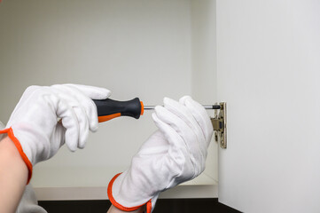 A man collects new furniture at his home. Furniture assembly