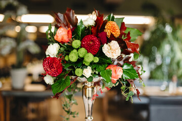 Arrangement of flowers on a table in a restaurant close-up