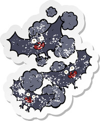 retro distressed sticker of a cartoon bats