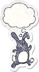 cartoon rabbit running and thought bubble as a distressed worn sticker