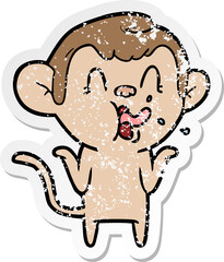 distressed sticker of a crazy cartoon monkey
