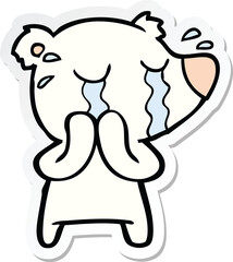 sticker of a cartoon crying polar bear