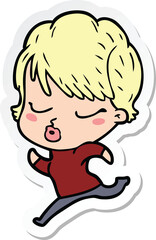 sticker of a cartoon woman with eyes shut