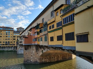 Fototapeta na wymiar Ponte vecchio bridge, tuscany, florance with arno river, colorful building in italy 