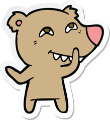 sticker of a cartoon bear showing teeth