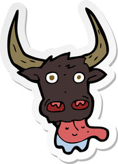 sticker of a cartoon cow face