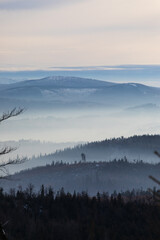 Foogy hills winter scenery in Poland Barania mount