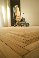 Old oak parquet polished with a sanding machine. New home concept shot.