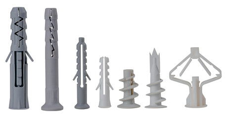 Plastic dowels of various types for fixing screws in the wall on an isolated background....