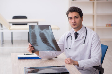 Young male doctor radiologist working in the clinic